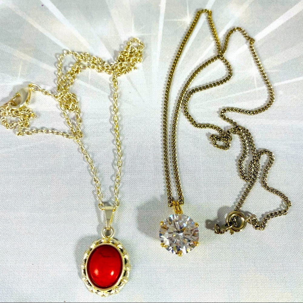 Two beautiful costume jewelry pendant necklaces red cabochon clear cut CZ